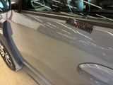 a car that has a sticker on the side of it