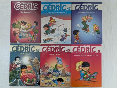 quatre livres pour enfants sont alignés sur une surface blanche