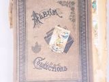an old book with a picture of a cat on it