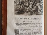 an open book with a picture of a man on a horse