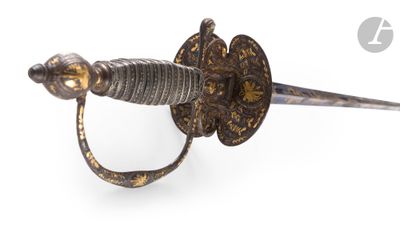 an old sword with a metal handle on a white background