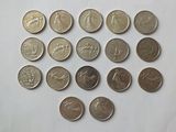 a lot of coins that are on the table