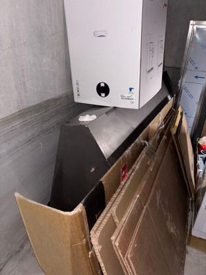 a box that is sitting on top of a refrigerator