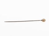 a close up of a needle with a needle tip on a white background