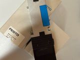a watch that is sitting on top of a piece of paper