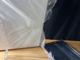 a laptop computer sitting on top of a wooden table