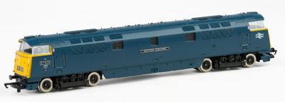 a blue and yellow train engine on a white background