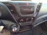 a dashboard of a car with a radio and other controls
