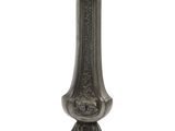 a candle that is sitting on a stand on a white background