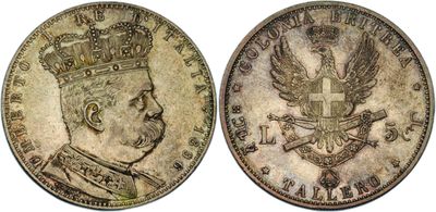 a silver coin with a crown on top of it
