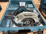 a blue box with a circular saw in it