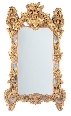 a mirror that is sitting on the wall