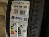 tires are stacked on top of each other in a garage