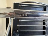 a close up of a metal object with a number on it