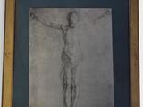 framed drawing of a man on a crucifix