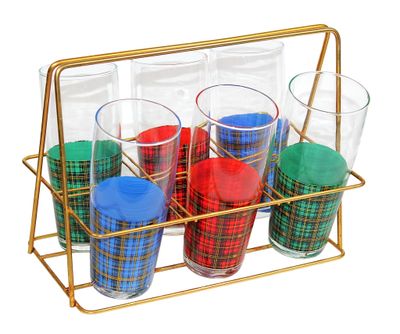 four glasses in a gold holder on a white background