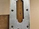 a close up of a measuring device mounted on a wooden pole