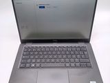 a laptop computer that is sitting on a table
