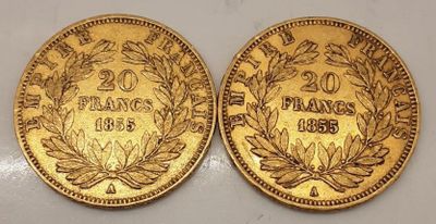 deux pièces d'or, dont l'une est ornée d'une couronne et l'autre d'un feuillage de laurier