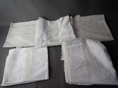 four pieces of white linen with embroidered trims and a monogrammed monogram