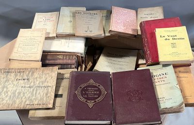 a lot of old books on a table together