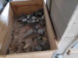 a picture of a wooden box with metal parts inside of it