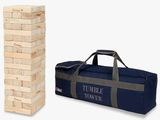 the large wooden tower is next to a duffel bag