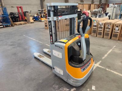 a picture of a forklift in a warehouse