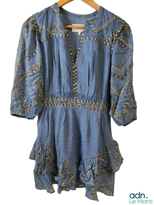 an image of a blue dress on a hanger
