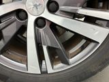 a close up of a tire on a car ' s rim