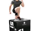 the man is standing on top of a box with his foot on it