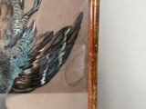 a picture of a painting of a bird in a picture frame