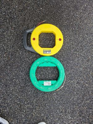 a yellow and green object on the ground next to a pair of shoes