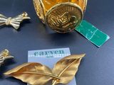 three pieces of gold leaf brooches and a gold bird brooch