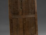 an old wooden door with four panels on the top and bottom