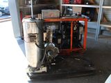 an image of a machine that is in a garage