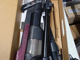 a box with a vacuum and other items inside of it