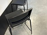 two chairs that are sitting in front of a counter