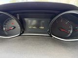 a close up of a car dashboard with a speedometer