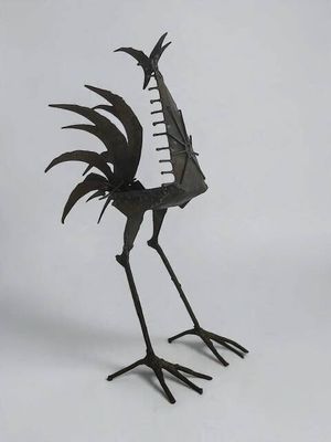 sculpture of a rooster made of metal on a white background