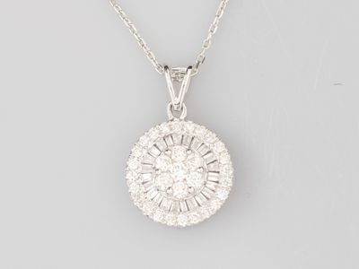 a white gold and diamond pendant on a chain