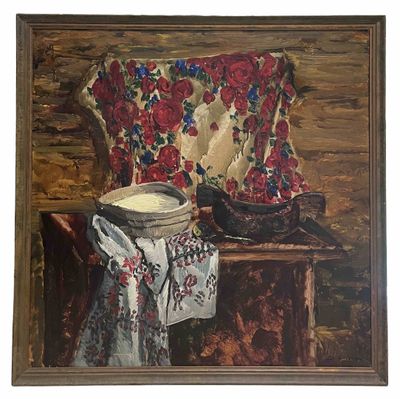 tableau à l'huile encadré représentant un bol de lait et une paire de bottes de cow-boy posés sur une chaise