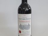 a bottle of wine that is sitting on a table
