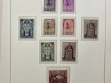 an image of a picture of a group of stamps on a sheet of paper