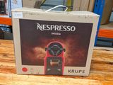 a box of nespresso krups sitting on a table