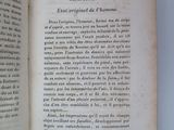 an open book with a picture of a cat on it