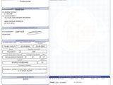 a close up of a document with a picture of a person on it