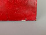 painting of a red box on a gray surface with a white background