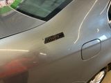 a car with a sticker on the side of it