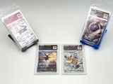 trois paquets de cartes à collectionner pokemon posés sur une surface blanche